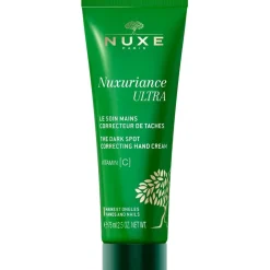 De donkere vlekken corrigerende handcrème