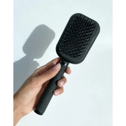 Gepatenteerde haarborstel met zelfreinigende functie