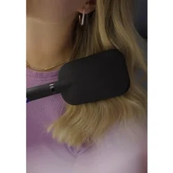 Gepatenteerde haarborstel met zelfreinigende functie